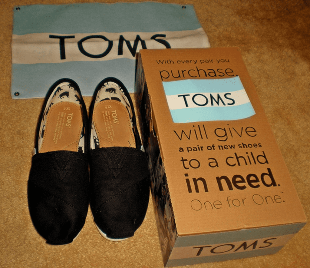 TOMS Shoes integrates social responsibility into its brand identity. Image Source: Avada Commerce