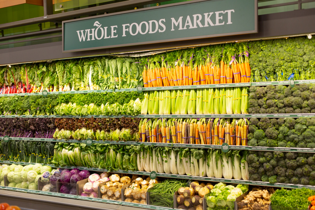Whole Foods strategically appeals to more educated consumers by emphasizing organic and sustainable products. Image Source: Framingham Source