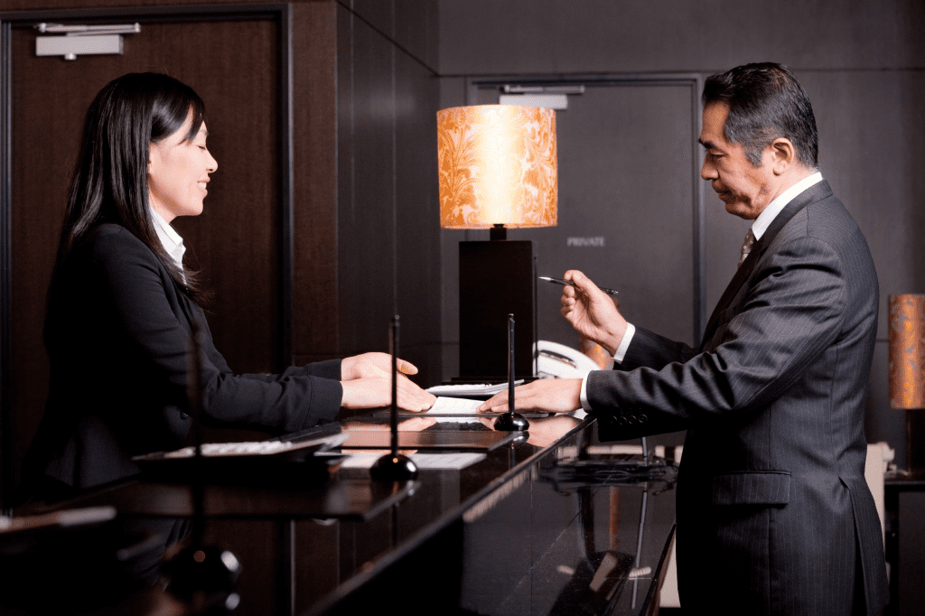 A hotel invests in customer service training for its front desk staff, leading to improved guest interactions, reduced complaints, and elevated CSAT scores. Image Source: Hotel Management